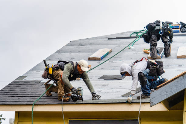 Professional Roofing technician working in Centerport, NY